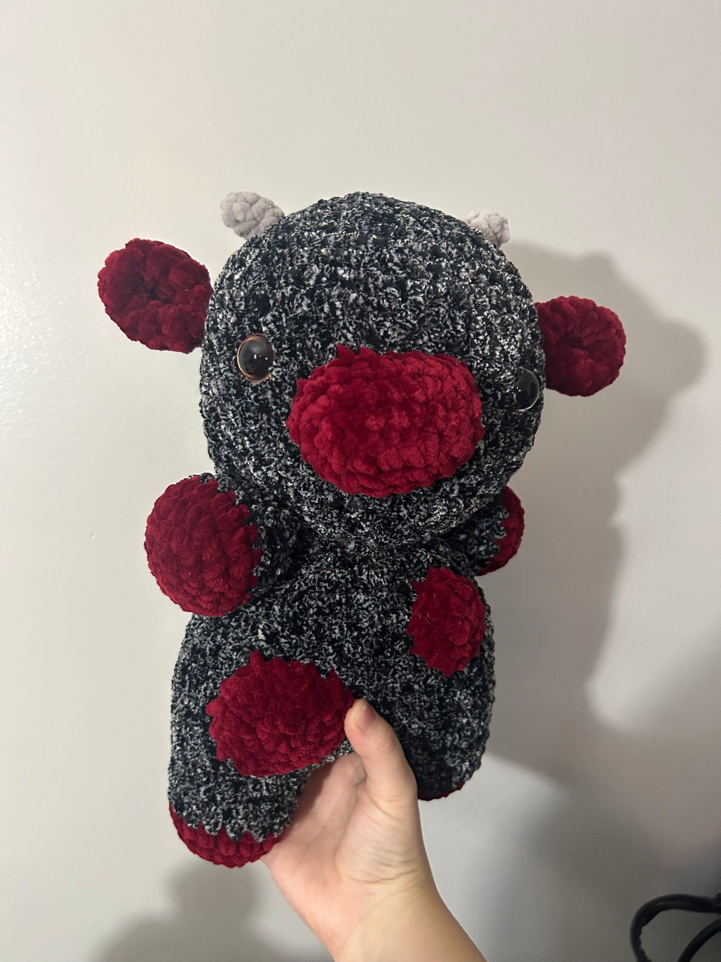 Large black speckled cow